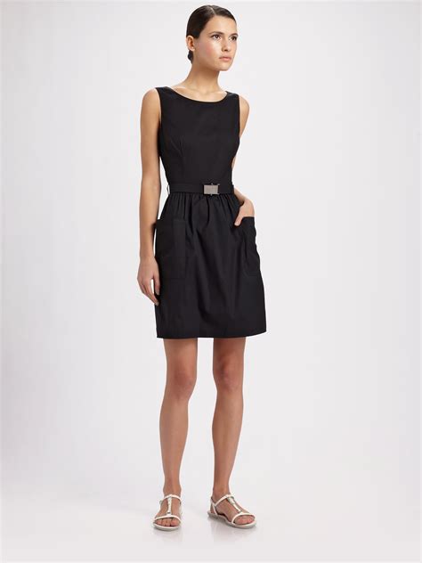 prada sleeveless belted black dress.